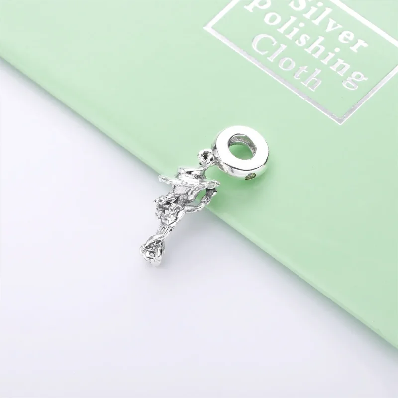 (bilde for) Pandora Disney Jessie sølv dingler med gylden farget cubic zirconia, svart og gu - Vis 3
