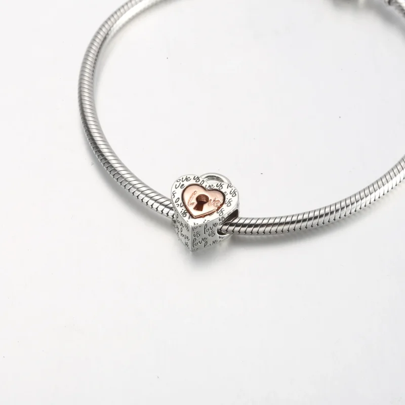 (bilde for) Pandora Tofarget Hengelås Delbart Hjerte Charm - 782505C00 - Vis 5